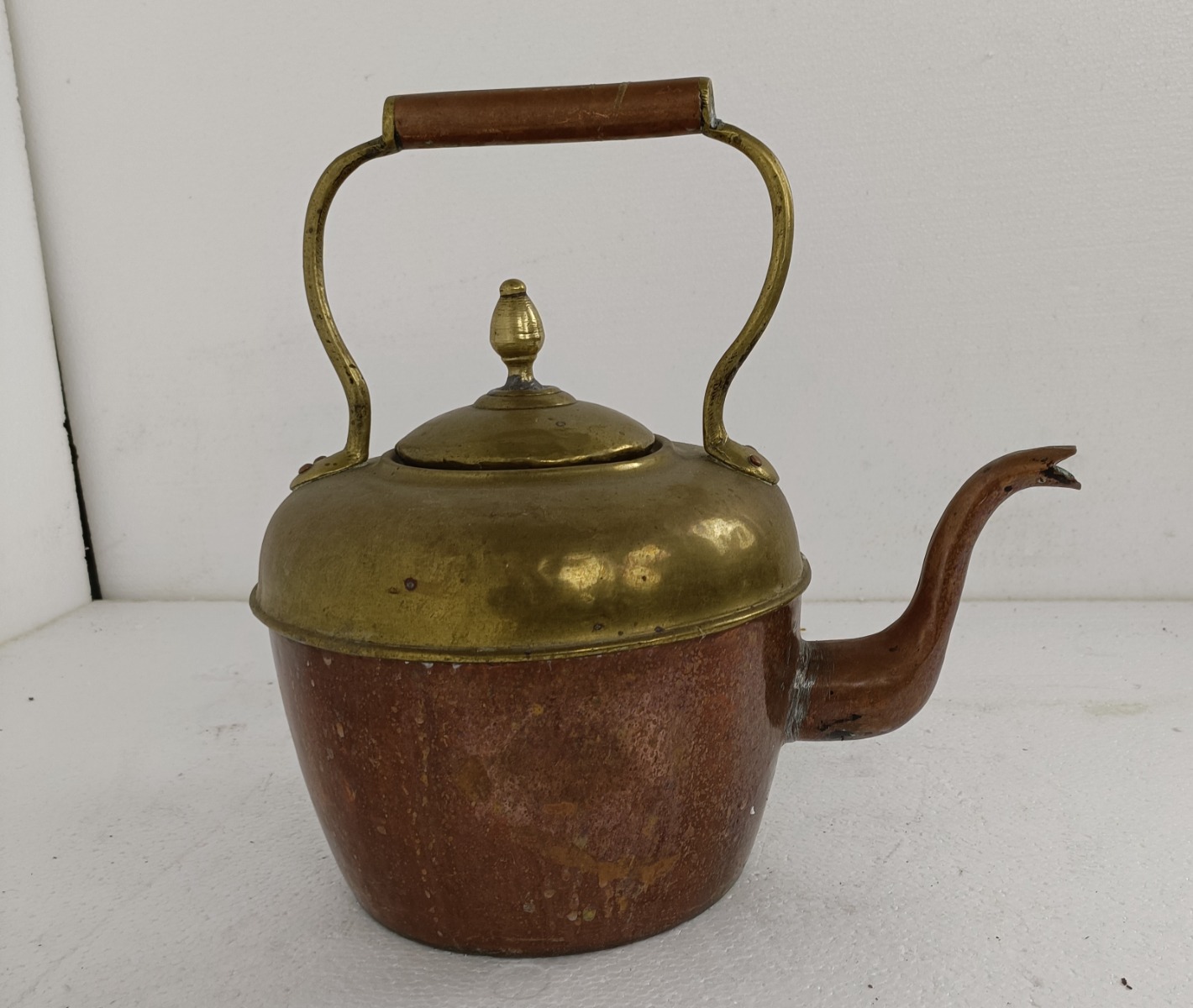 Antique copper tea kettle